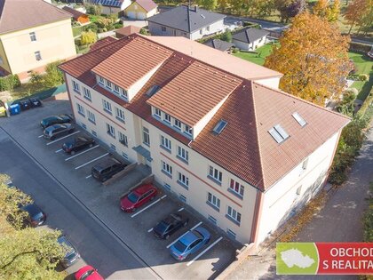 Milovice  byt 1+KK s parkovacím stáním na vlastním pozemku