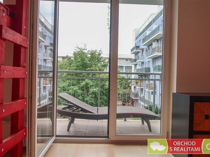 The 1+KNT apartment unit with a balcony